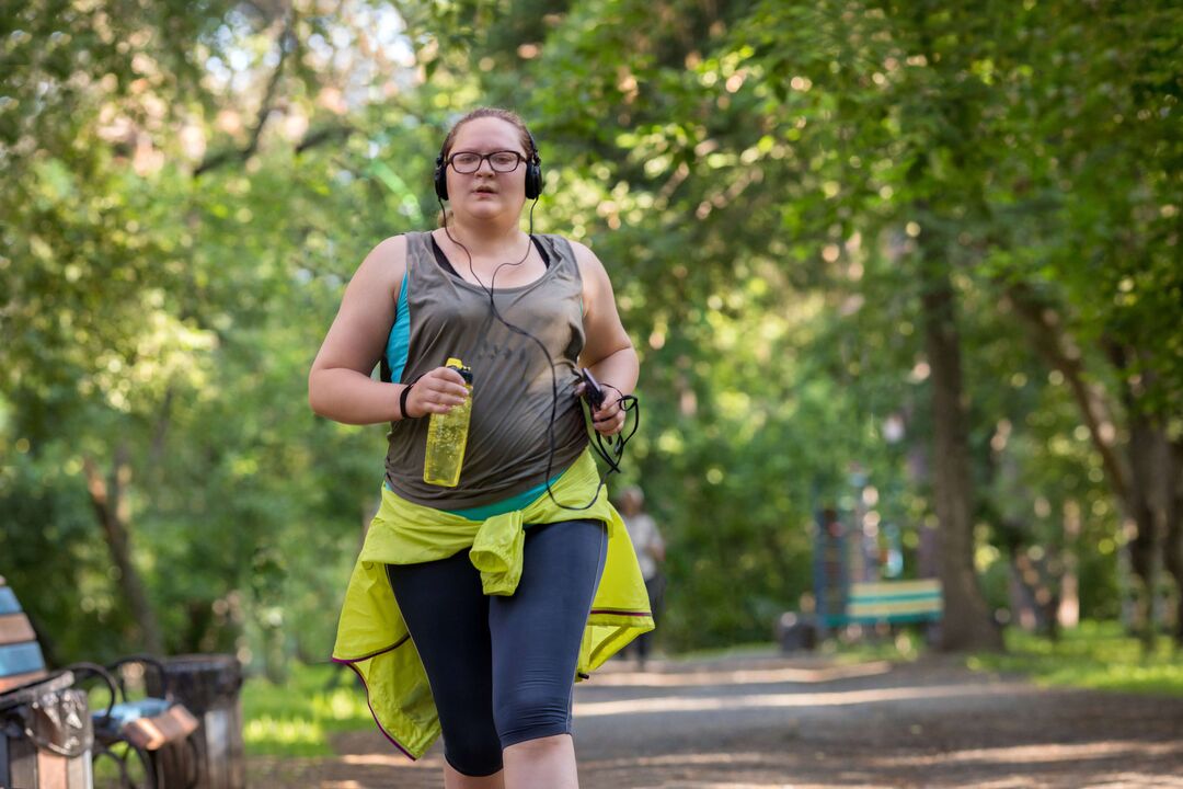 Overweight girl started jogging to lose weight