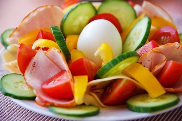 Vegetable salad on the egg and orange diet menu for weight loss
